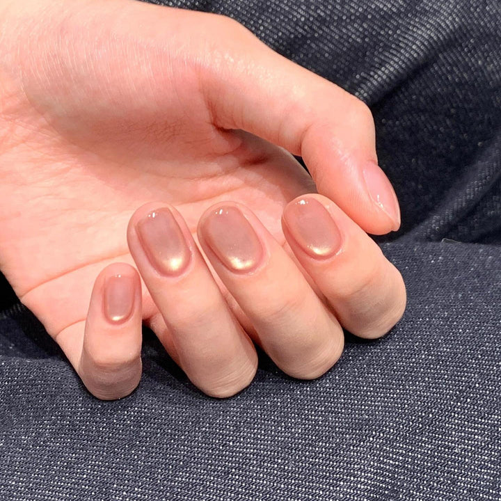 Shiny artificial nails with natural effect Stornfield
