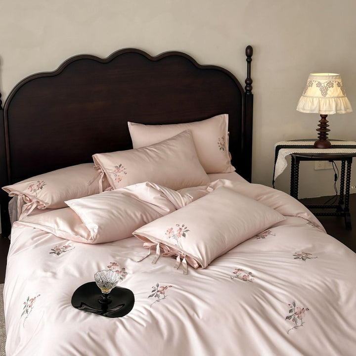 Satin bed cover set with embroidered rose branches, bow ties and silky-matte finish