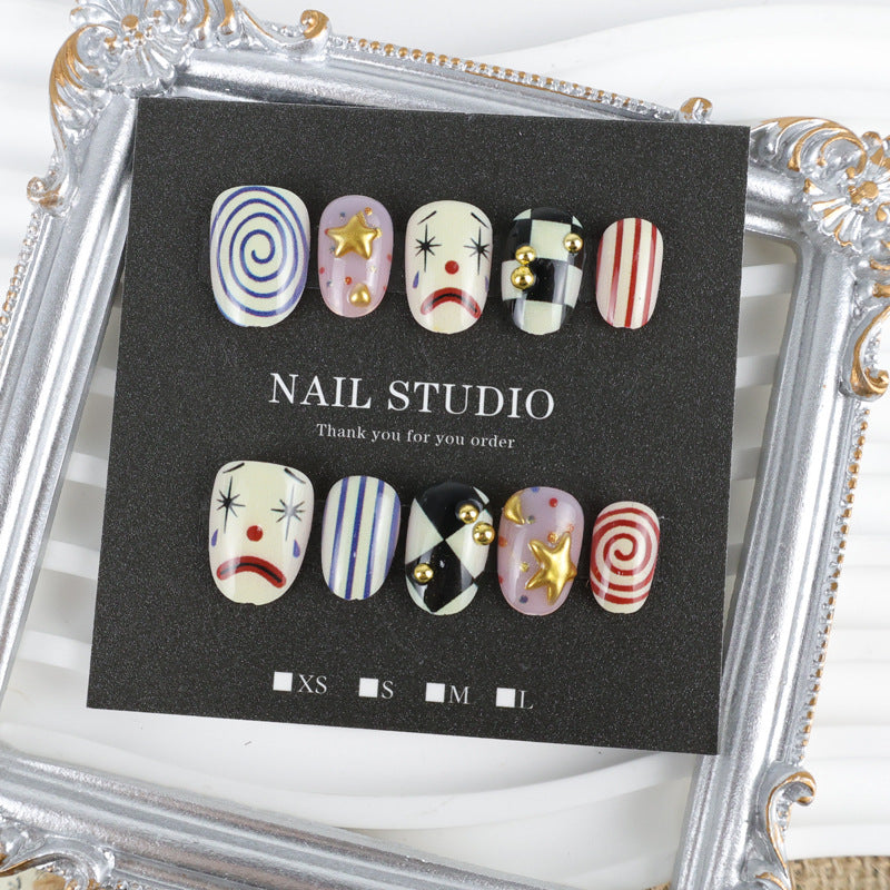 Artifical nail set with creative clown and star motifs Stornfield
