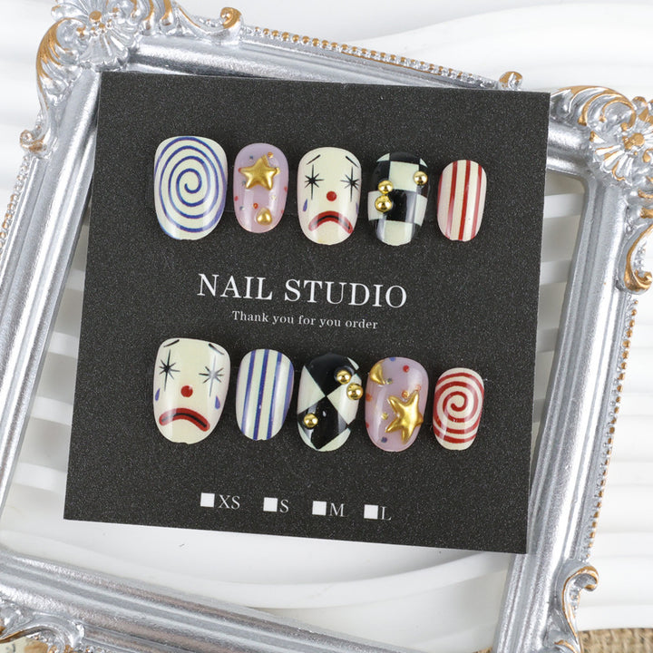 Artifical nail set with creative clown and star motifs Stornfield
