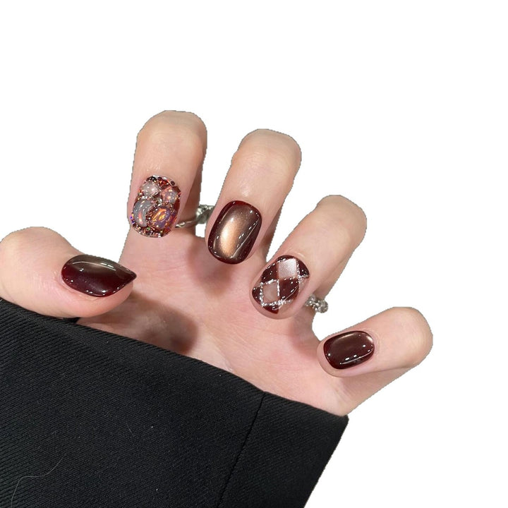 Artificial nails with creative rhinestone design Stornfield