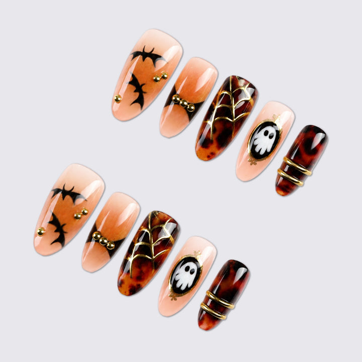 Halloween Artificial Nail Set with spooky designs and golden accents Stornfield