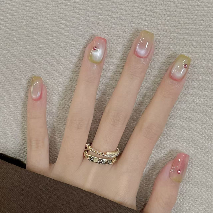 Artificial artificial nails with elegant ombre effects and glitter accents Stornfield