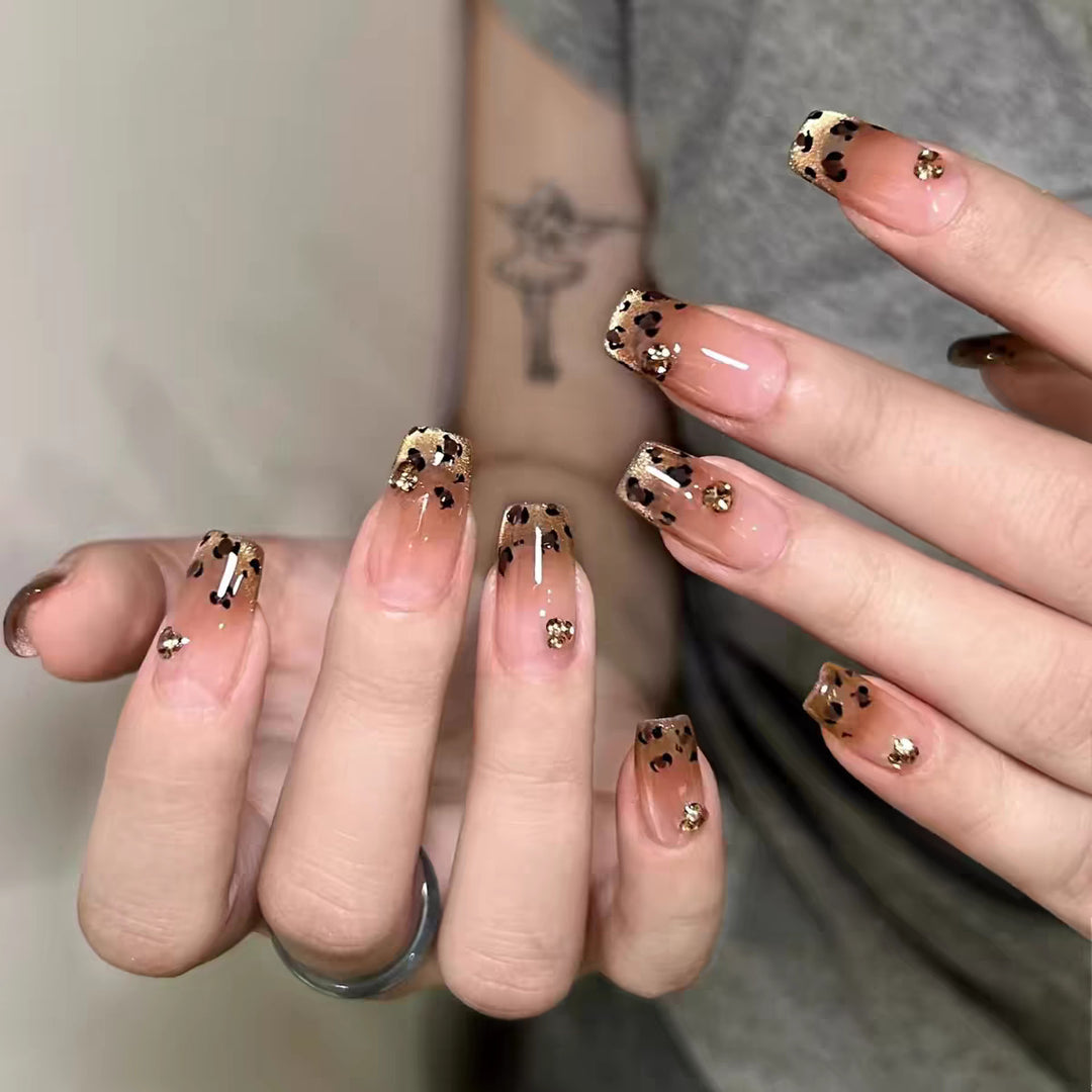 Artificial nails with elegant ombre effect and glitter coating Stornfield