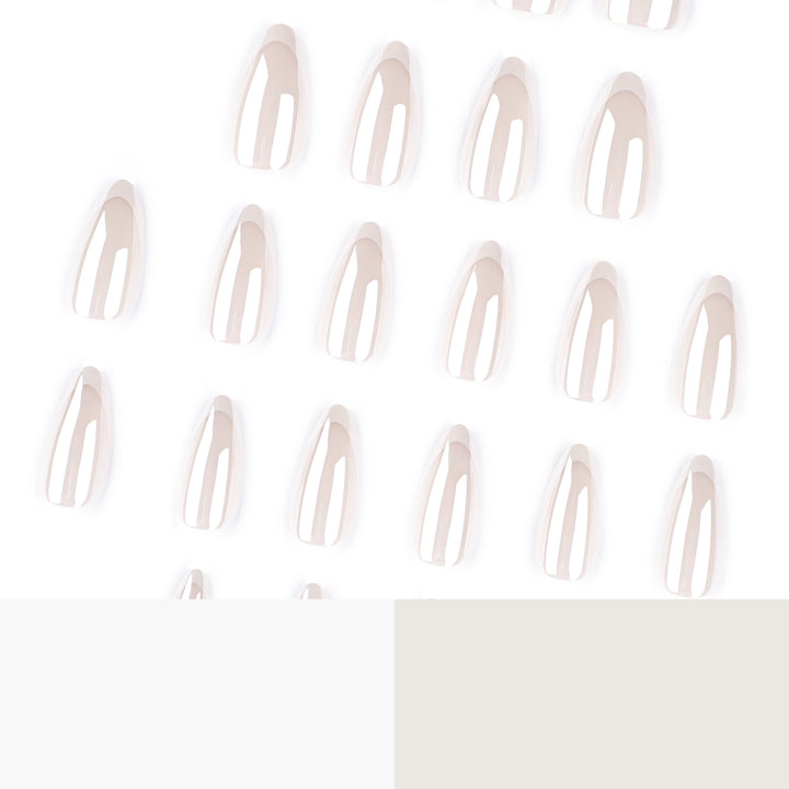 Artistic stiletto nails with elegant French tip embellishments Stornfield