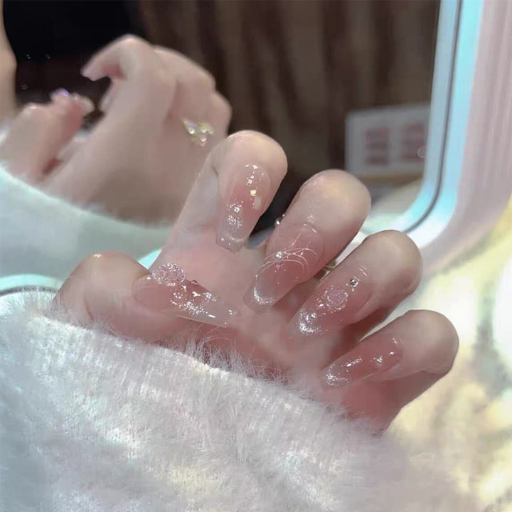 Artistic Press-On Nail Set with Glittery Star Accents Stornfield