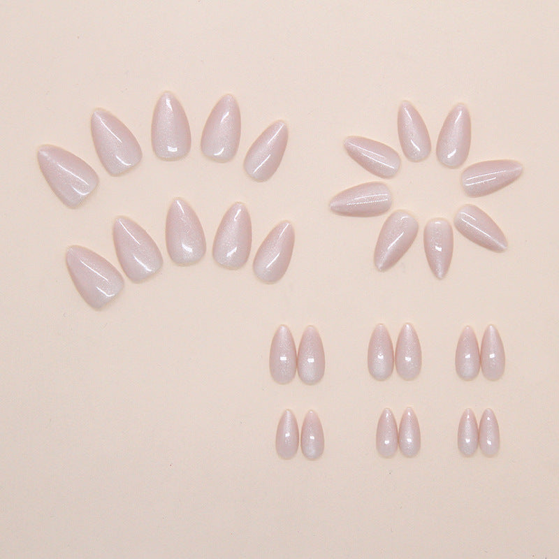 Artistic Glittered Almond-Shaped Nail Extensions Stornfield