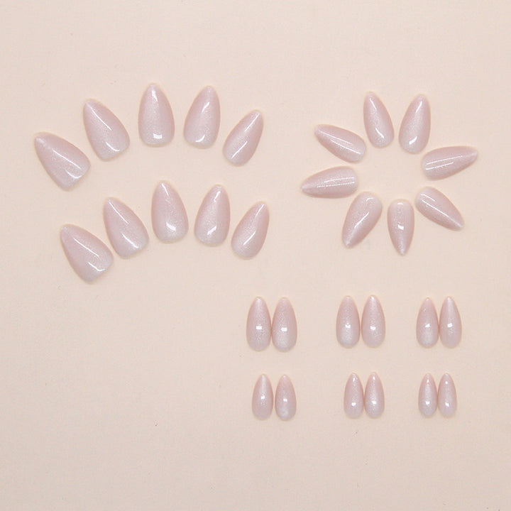 Artistic Glittered Almond-Shaped Nail Extensions Stornfield