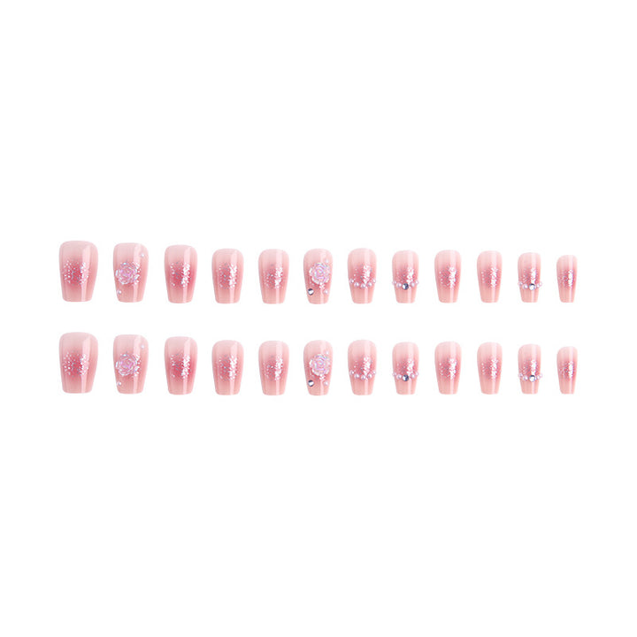 Artificial nail set with sparkling glitter and pearl decorations Stornfield