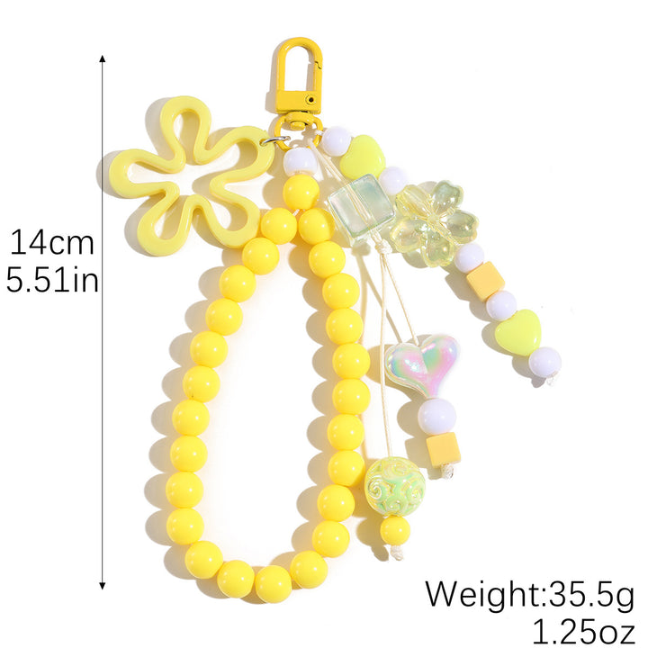 Playful keychain with flower and butterfly details Stornfield