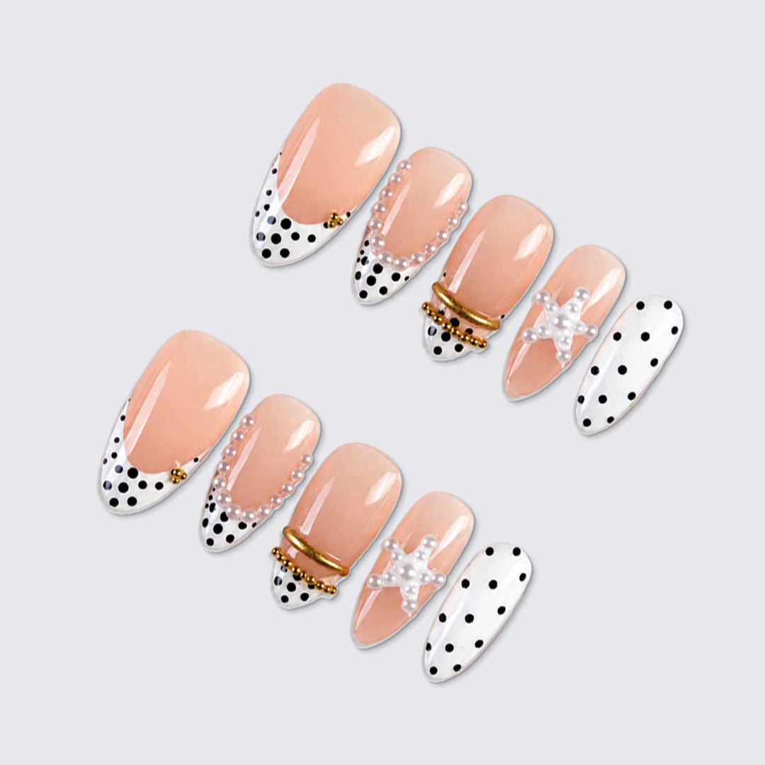 Nail set with elegant pearl and dot accents Stornfield