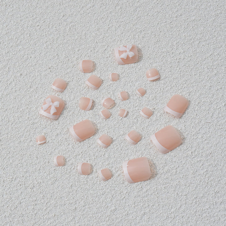 Artificial nail set with romantic bow motifs Stornfield