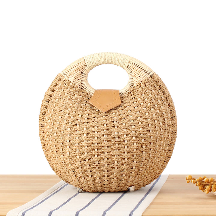 Round straw bag with elegant leather handle Stornfield