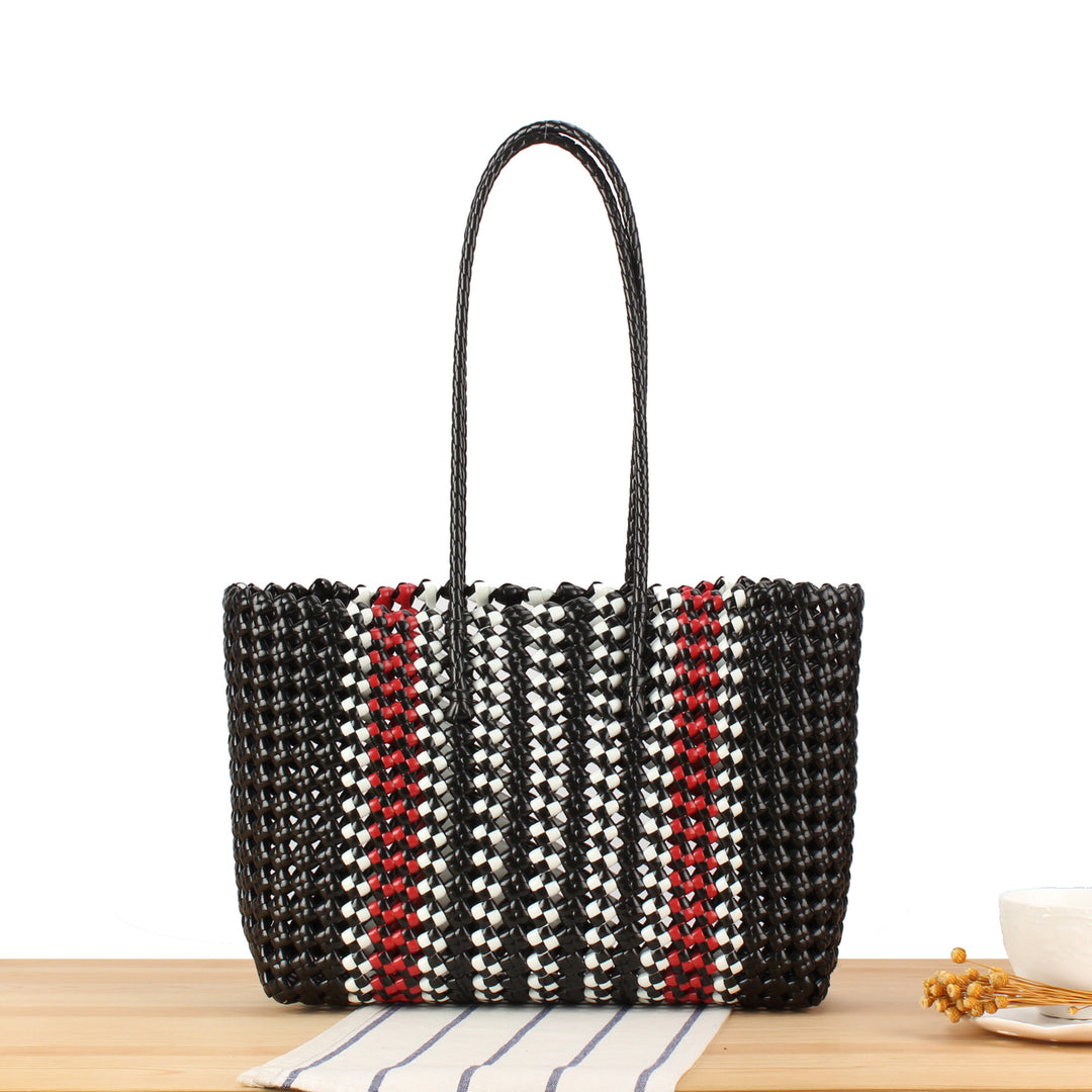 Stylish handbag made of braided material Stornfield