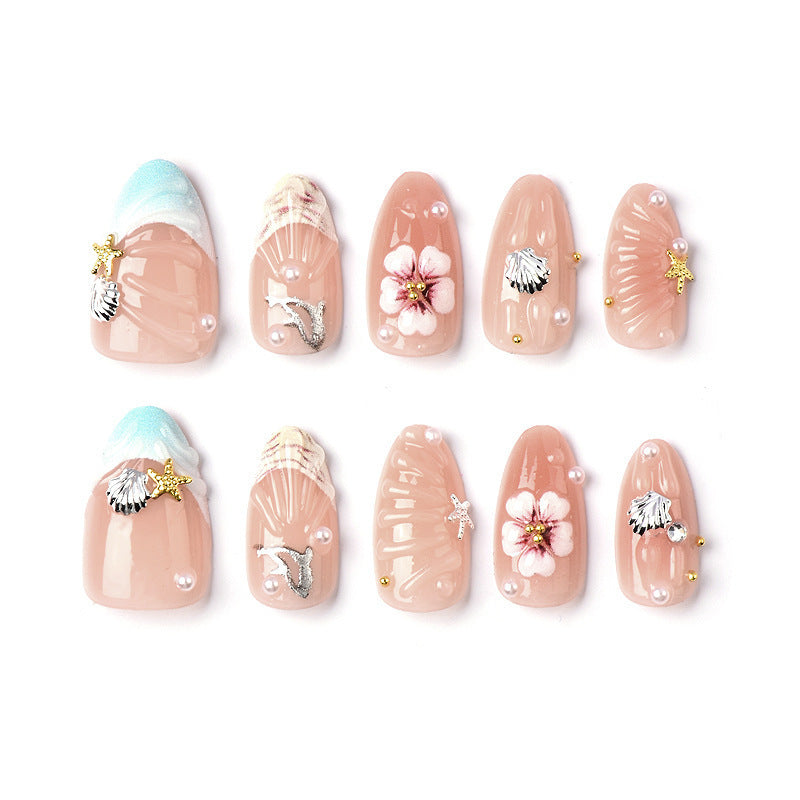 Acrylic nail set with filigree shell and flower decorations Stornfield
