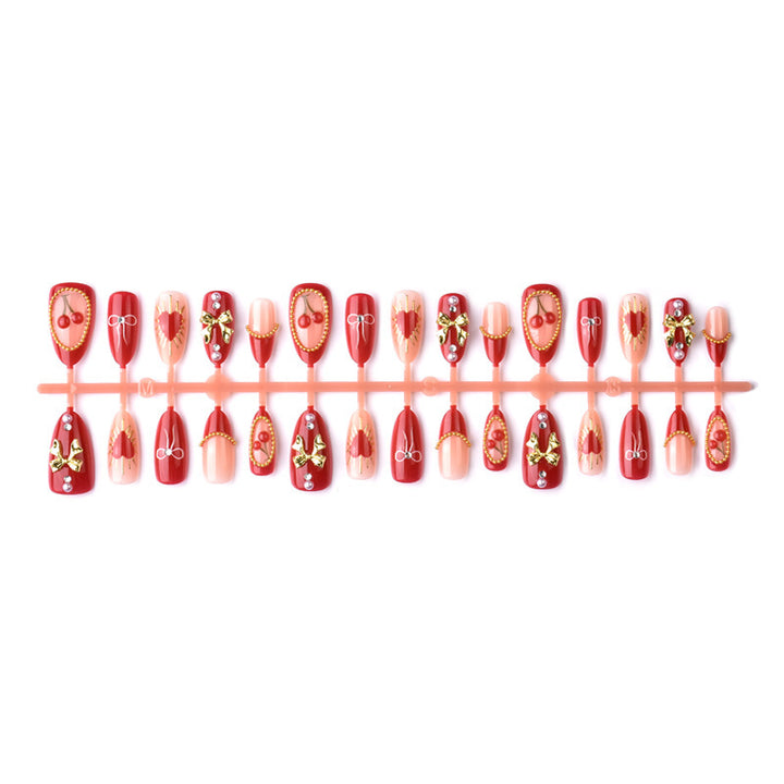 Artificial nails in romantic heart design Stornfield
