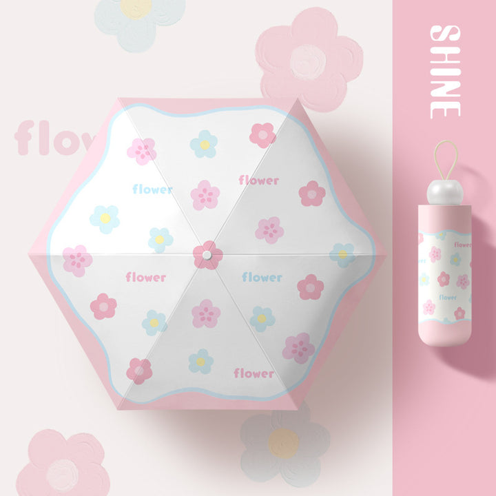 Ladies folding umbrella with playful flower design Stornfield
