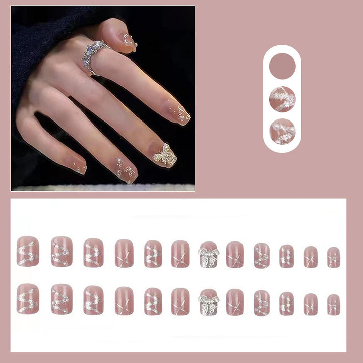 Artificial nails in an elegant design with 3D butterflies and glitter accents Stornfield