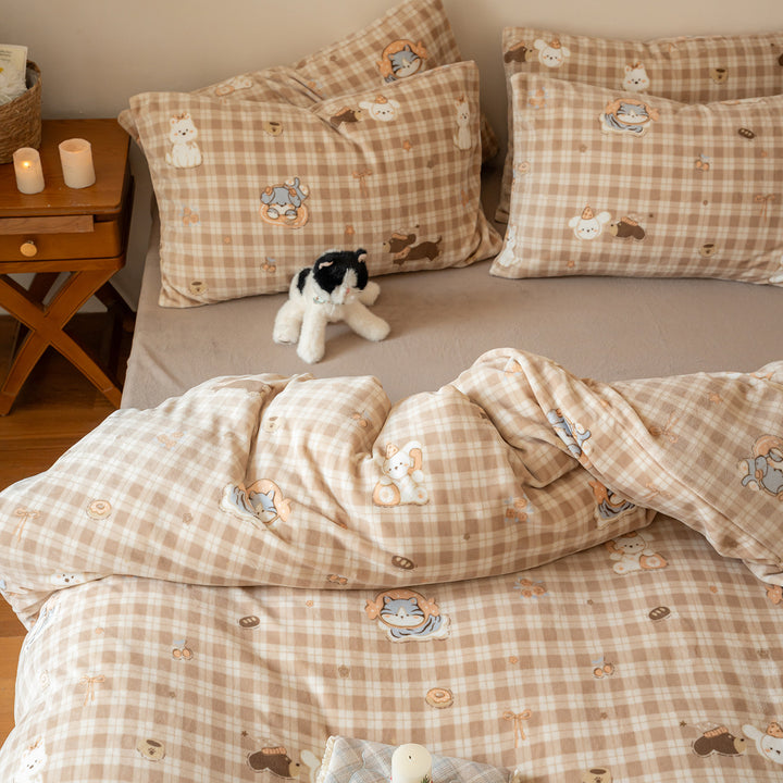 Soft flannel bedding set with checkered design and dog motifs