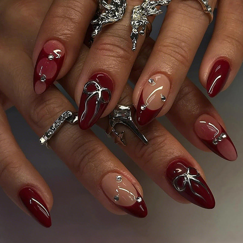 Artificial nail set with luxurious glitter and gemstone embellishments Stornfield
