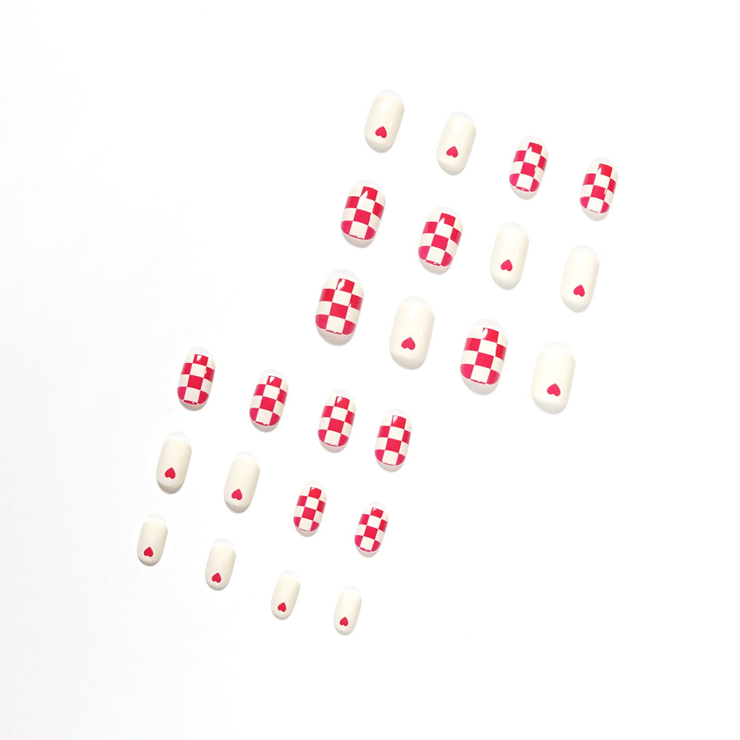 Trendy Nail Art with Heart and Checkered Patterns Stornfield