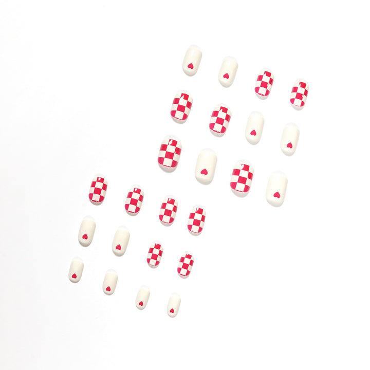 Trendy Nail Art with Heart and Checkered Patterns Stornfield
