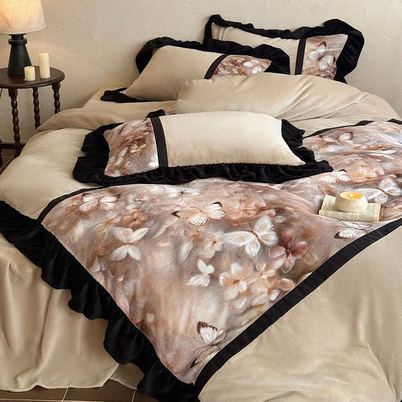 Satin bedding set with ruffle trim and floral butterfly design