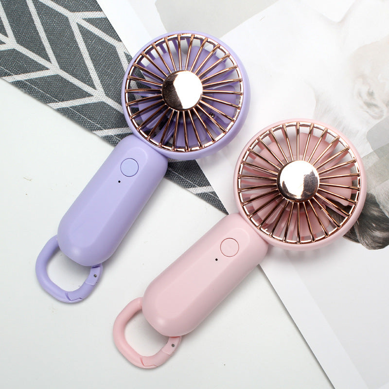 Unisex portable mini hand fan with USB charging and carrying strap Stornfield