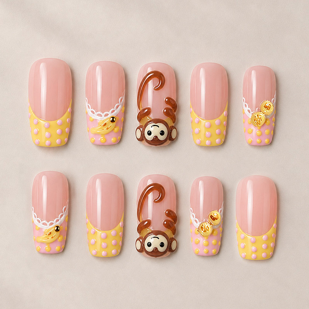 Artificial nail set with playful animal motifs and elegant embellishments Stornfield