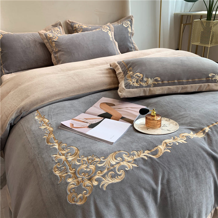 Elegant bed set made of cotton satin with baroque embroidery border and reversible blanket