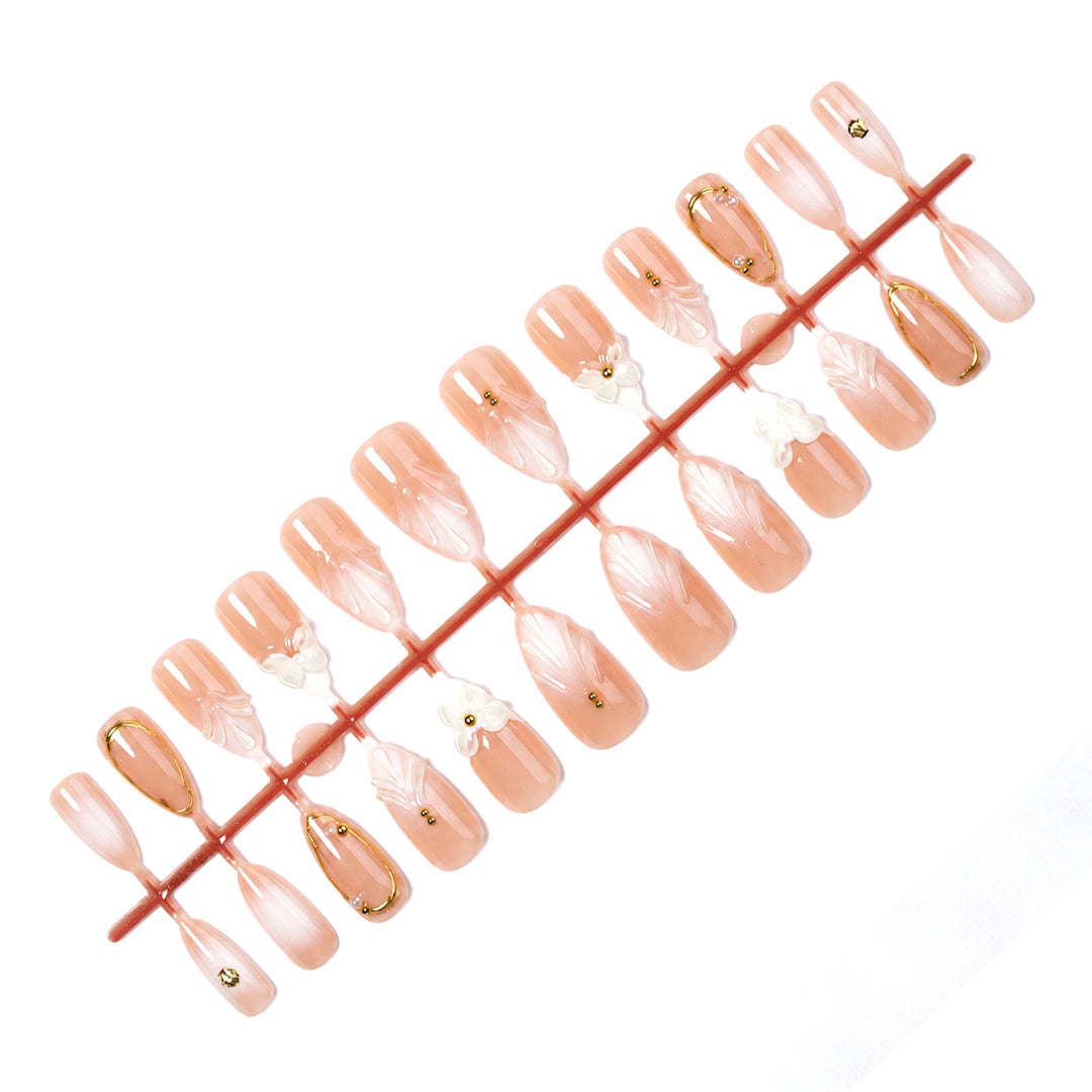 Acrylic nail set with elegant 3D designs and golden accents Stornfield