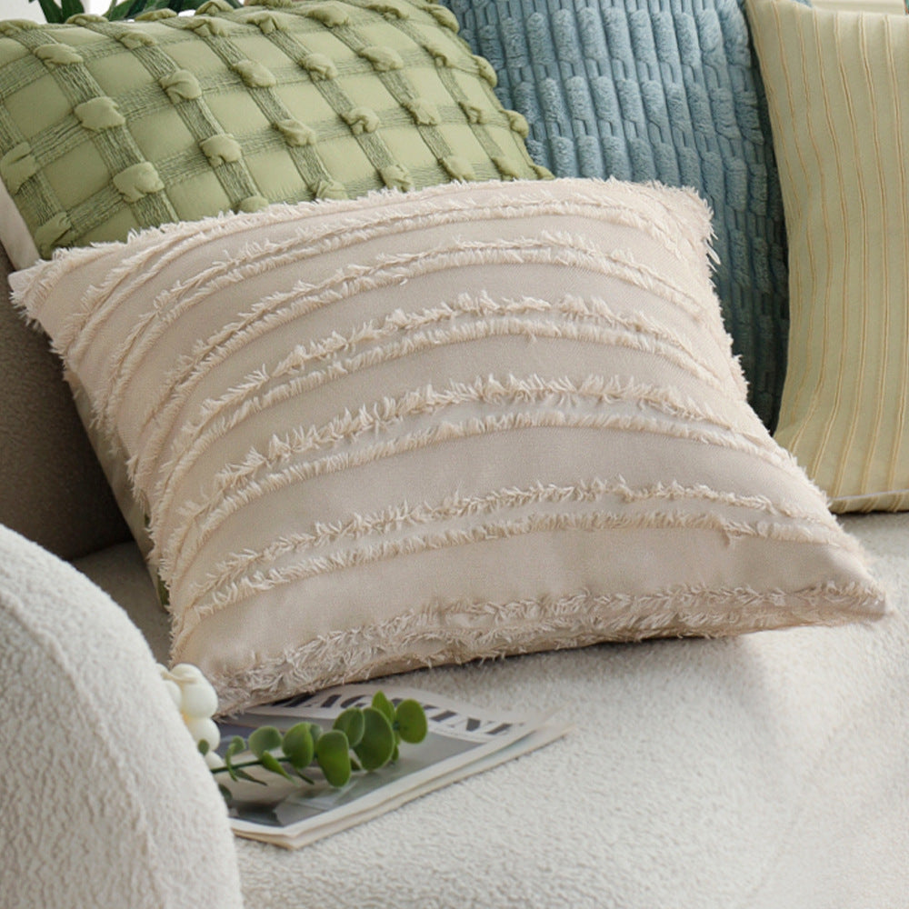 Long decorative pillows with structured surface