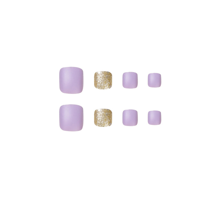 Artful toenail design with glamorous glitter accent Stornfield