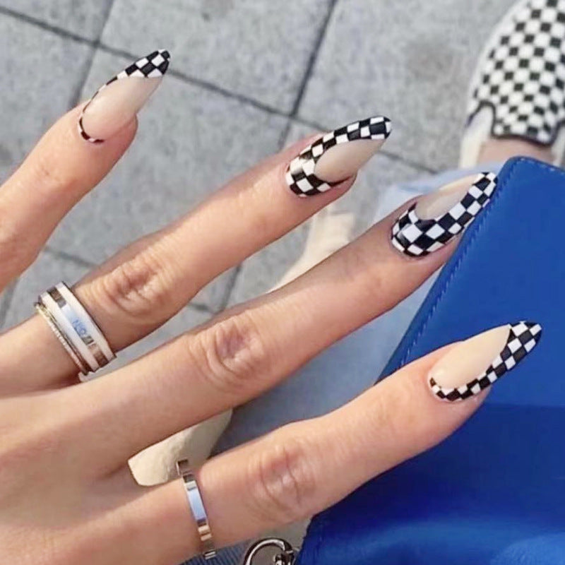 Artful nail extensions with an elegant leaf pattern Stornfield