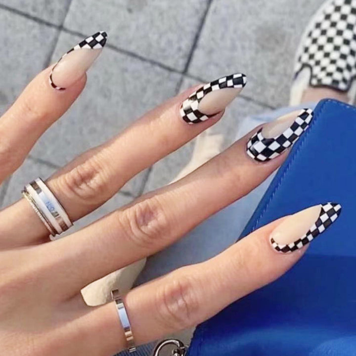Artful nail extensions with an elegant leaf pattern Stornfield