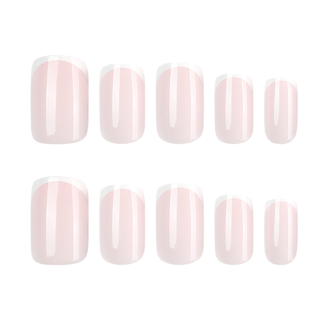Classic nail extensions with elegant French tips Stornfield