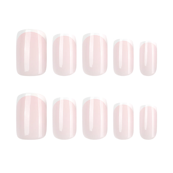 Classic nail extensions with elegant French tips Stornfield