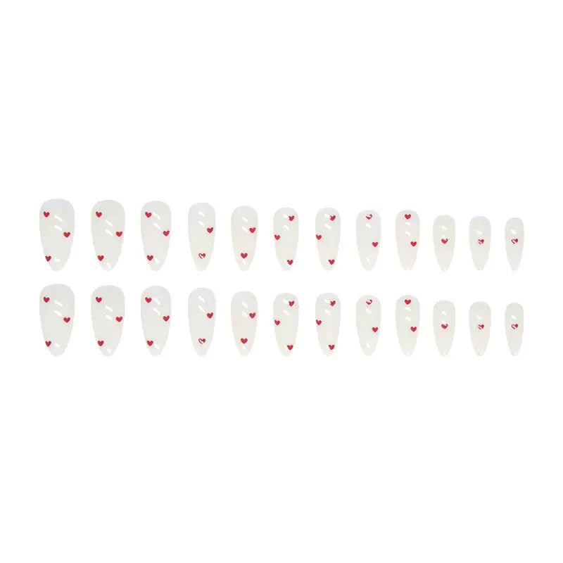 Nail set with playful heart design and elegant finish Stornfield