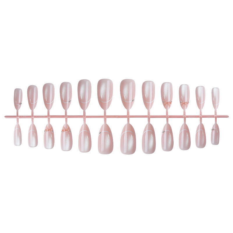 Artificial nail set with elegant bow and glitter accents Stornfield 1789119022