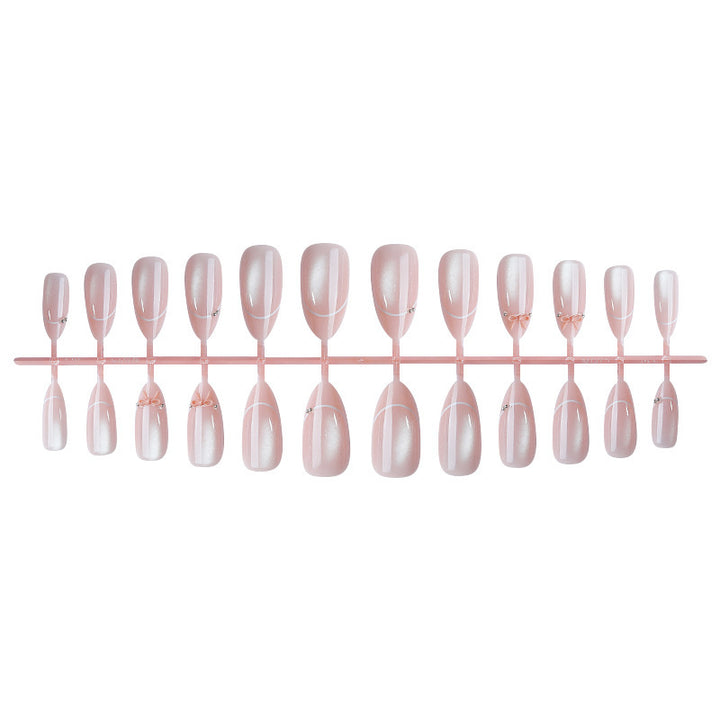 Artificial nail set with elegant bow and glitter accents Stornfield 1789119022