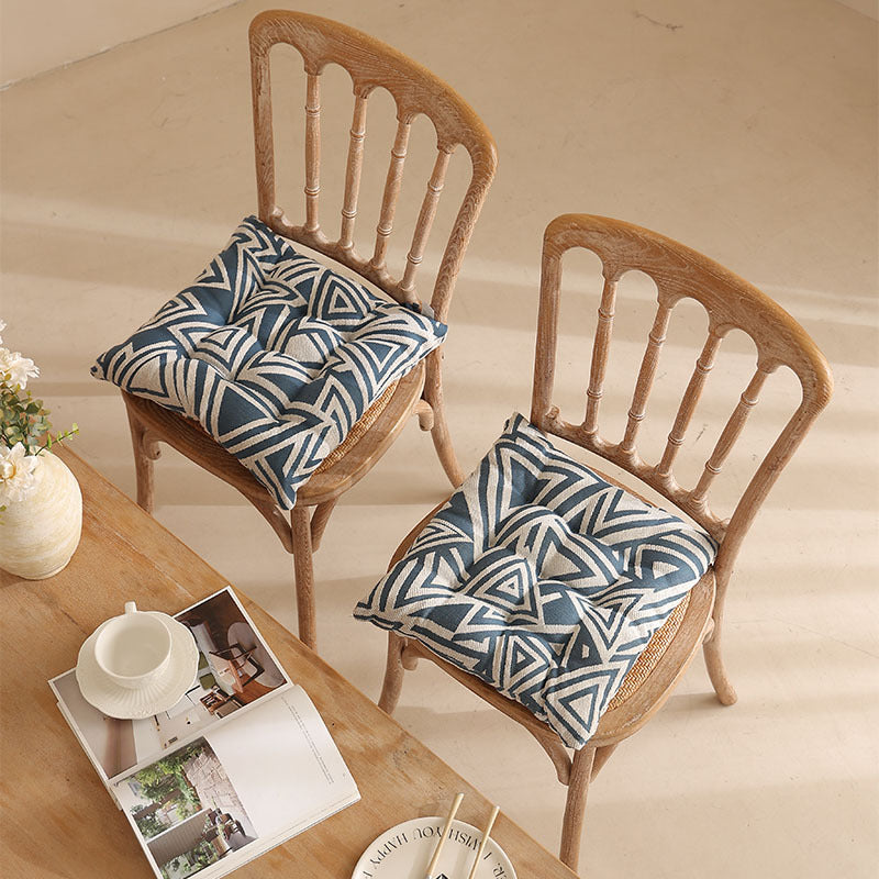 Padded quilted seat cushion with colorful button applications and non-slip underside Stornfield