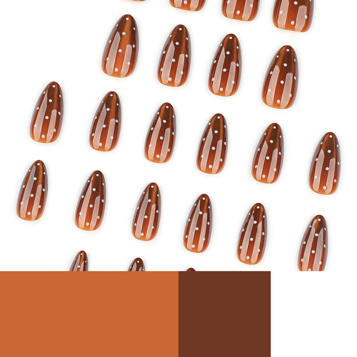Artful nail extensions with glossy ombre effect and elegant dots Stornfield
