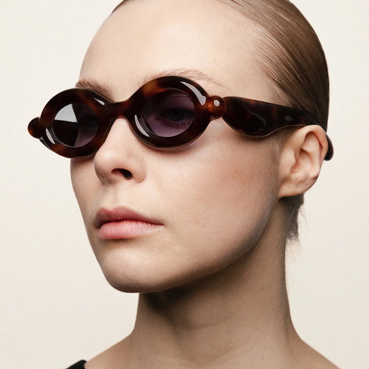 Women's sunglasses in trendy retro design with oval lenses Stornfield