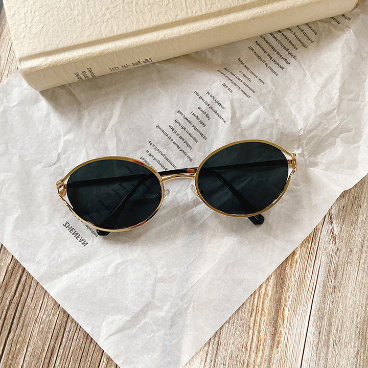 Round Sunglasses with Golden Accents Stornfield