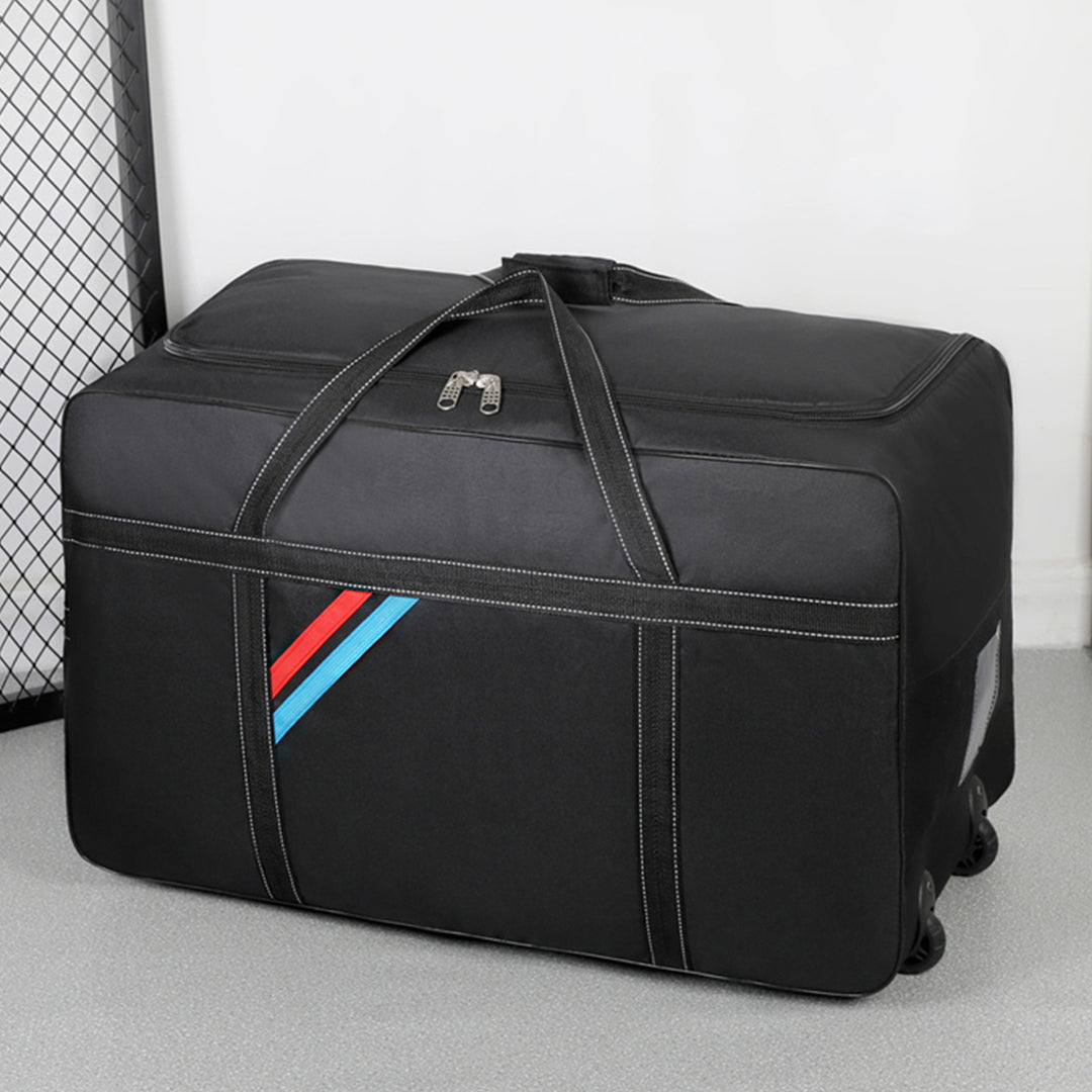 Spacious travel bag with lightweight wheels and reinforced carrying handle Stornfield