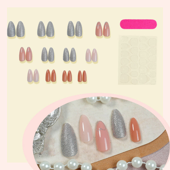 Acrylic nail set with heart and glitter design Stornfield