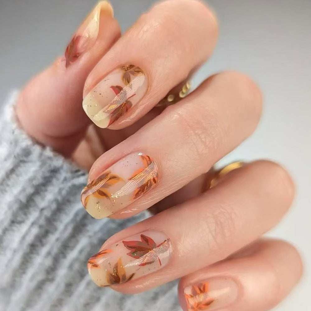 Artistic Press-On Nail Set with Floral Accents Stornfield