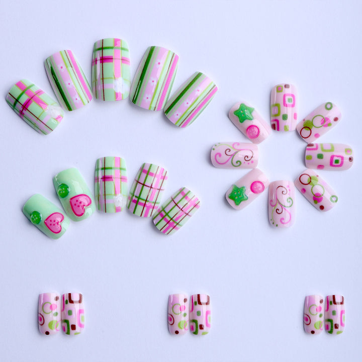 Artificial nails with playful geometric designs Stornfield