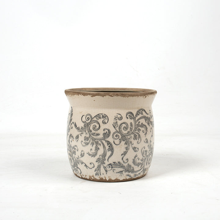 Decorative ceramic plant container with artistic design Stornfield