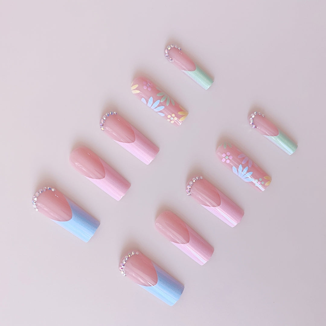Artificial nail set with floral 3D embellishments and rhinestone accents Stornfield